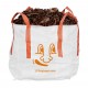 Kleine big bag gevuld met bladeren.