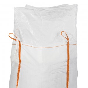 Bulk Bag with discharge spout and closing skirt